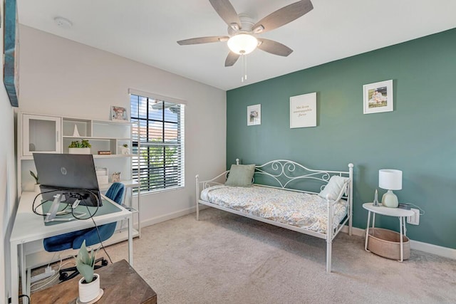 1012 Willow Pl, Riviera Beach, FL 33410 - bedroom featuring carpet, baseboards, a desk, and ceiling fan