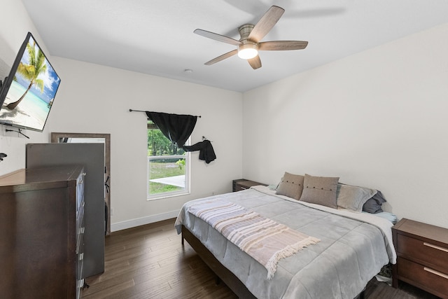 7633 NW 93rd Ct, Okeechobee, FL 34972 - bedroom featuring baseboards, ceiling fan, and wood finished floors