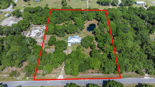 7633 NW 93rd Ct, Okeechobee, FL 34972 - aerial view with a forest view