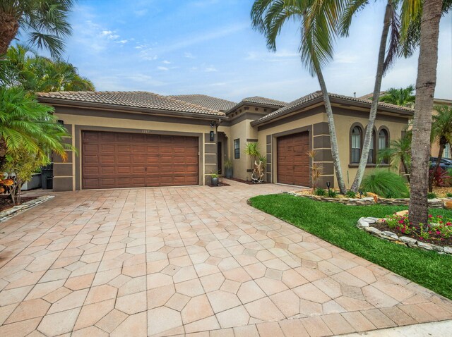 1289 Beacon Cir, Wellington, FL 33414 - office space with crown molding, a tray ceiling, light tile patterned floors, and a chandelier