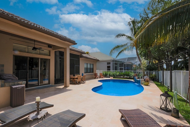 1289 Beacon Cir, Wellington, FL 33414 - view of swimming pool featuring a fenced backyard, a ceiling fan, and a patio