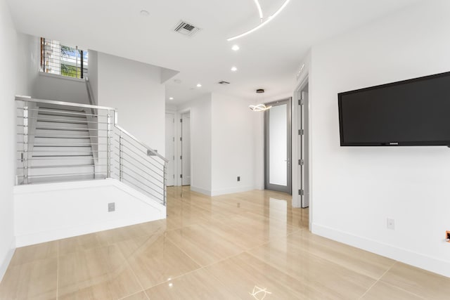 4240 NW 17th Ave, Boca Raton, FL 33431 - unfurnished living room with stairs, recessed lighting, light tile patterned floors, and baseboards