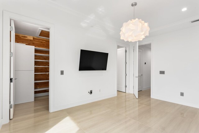 4240 NW 17th Ave, Boca Raton, FL 33431 - unfurnished living room featuring baseboards and recessed lighting