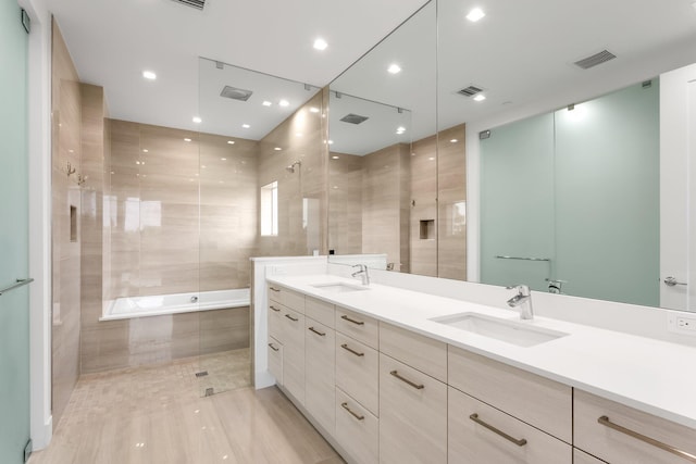 4240 NW 17th Ave, Boca Raton, FL 33431 - bathroom featuring double vanity, a relaxing tiled tub, and a tile shower