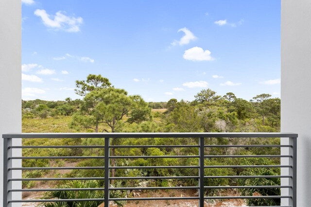 4240 NW 17th Ave, Boca Raton, FL 33431 - balcony featuring a forest view
