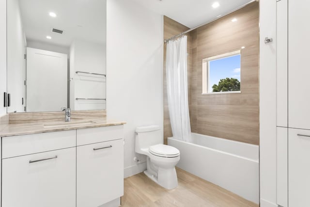 4240 NW 17th Ave, Boca Raton, FL 33431 - bathroom with toilet, vanity, wood finished floors, recessed lighting, and shower / tub combo with curtain