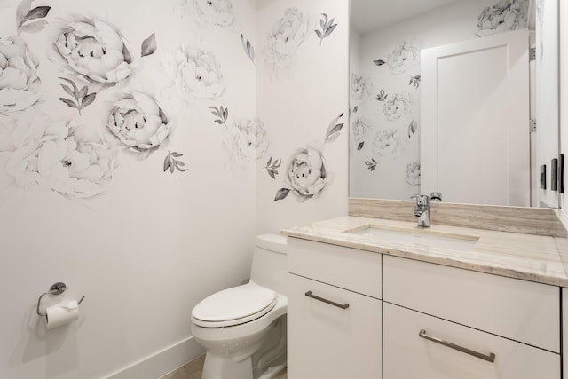 4240 NW 17th Ave, Boca Raton, FL 33431 - bathroom featuring toilet, vanity, and baseboards