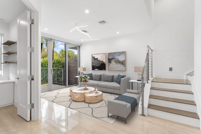 4240 NW 17th Ave, Boca Raton, FL 33431 - living area with stairs, expansive windows, light tile patterned flooring, and recessed lighting