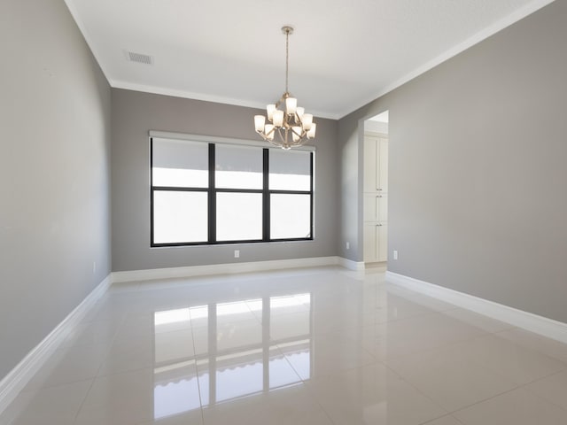spare room featuring visible vents, ornamental molding, light tile patterned floors, baseboards, and a chandelier