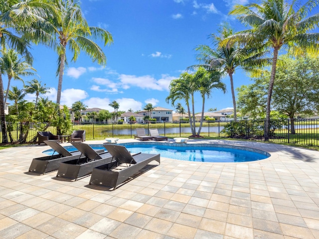 view of pool with a patio, fence, and a fenced in pool