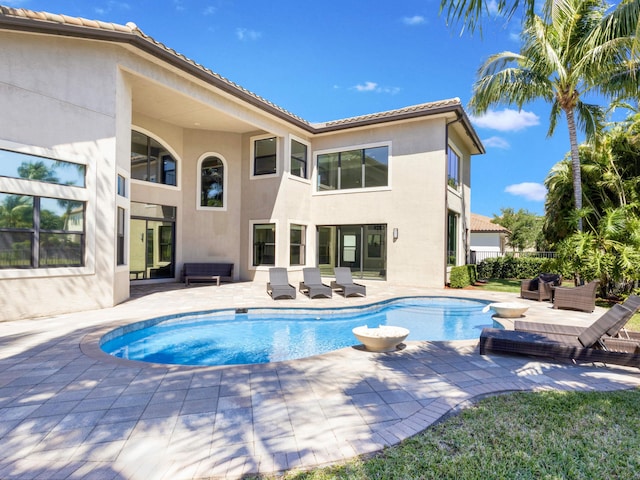 pool featuring a patio