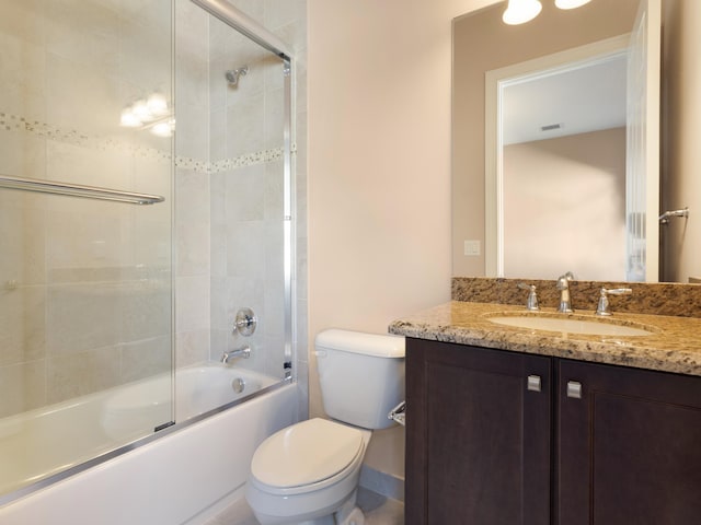 full bathroom with enclosed tub / shower combo, visible vents, toilet, and vanity