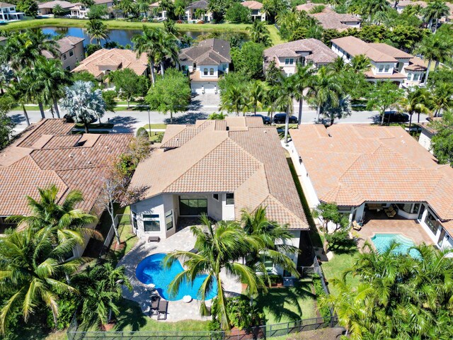 birds eye view of property with a residential view