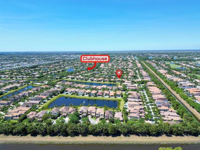 aerial view with a residential view and a water view