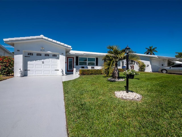 ranch-style house with an attached garage, stucco siding, a tile roof, concrete driveway, and a front lawn