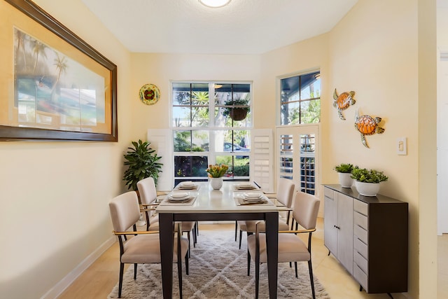 213 Ocean Dunes Cir, Jupiter, FL 33477 - dining room with baseboards