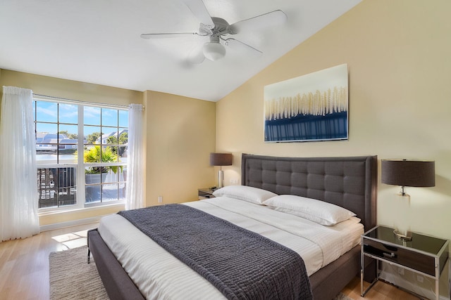 213 Ocean Dunes Cir, Jupiter, FL 33477 - bedroom featuring ceiling fan, wood finished floors, and vaulted ceiling