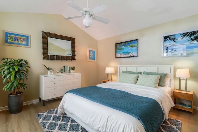 213 Ocean Dunes Cir, Jupiter, FL 33477 - bedroom featuring baseboards, lofted ceiling, wood finished floors, and ceiling fan