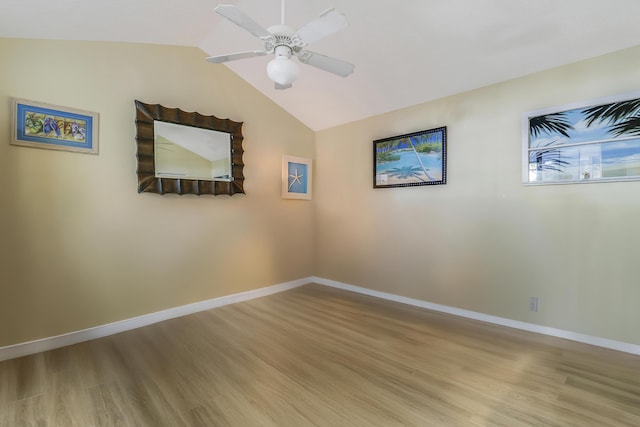 213 Ocean Dunes Cir, Jupiter, FL 33477 - unfurnished room with baseboards, lofted ceiling, wood finished floors, and ceiling fan