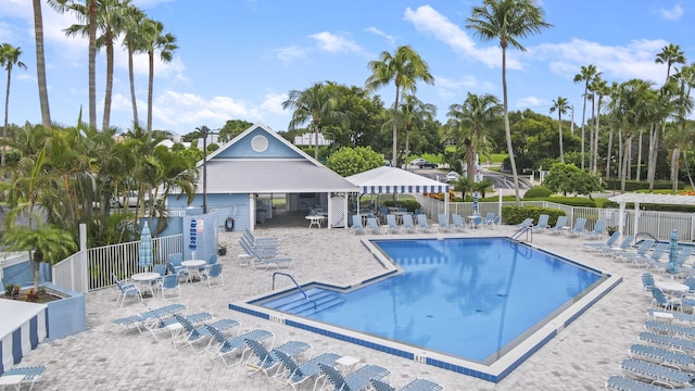 213 Ocean Dunes Cir, Jupiter, FL 33477 - pool featuring fence and a patio