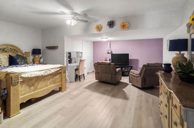 bedroom with light wood-type flooring and a ceiling fan
