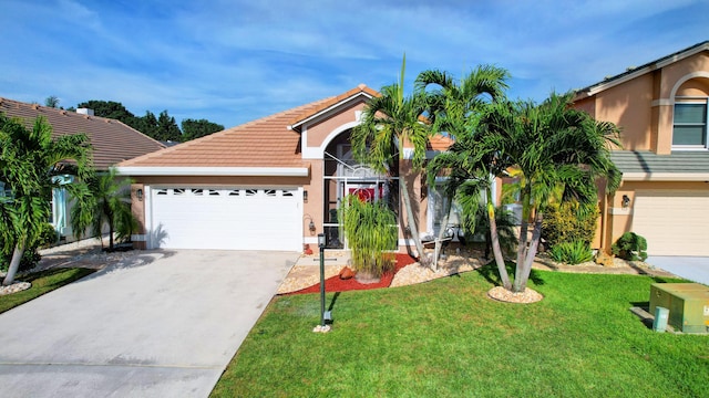 12693 Coral Breeze Dr, Wellington, FL 33414 - view of front of house featuring stucco siding, a front yard, driveway, and a tiled roof