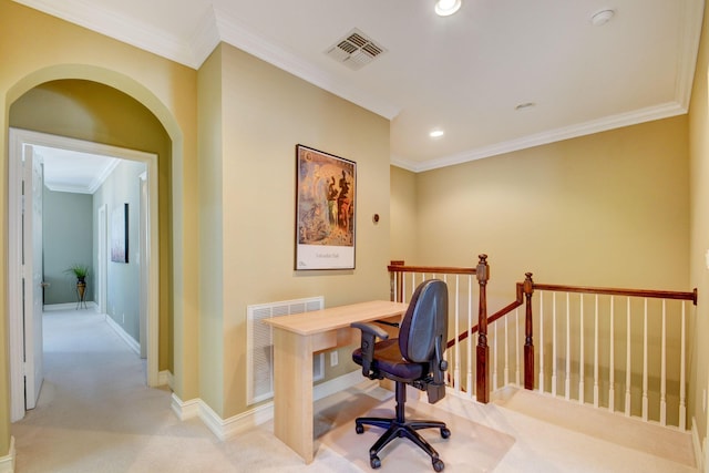 office area featuring visible vents, arched walkways, light carpet, and ornamental molding