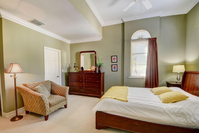 carpeted bedroom featuring visible vents, baseboards, a ceiling fan, and crown molding
