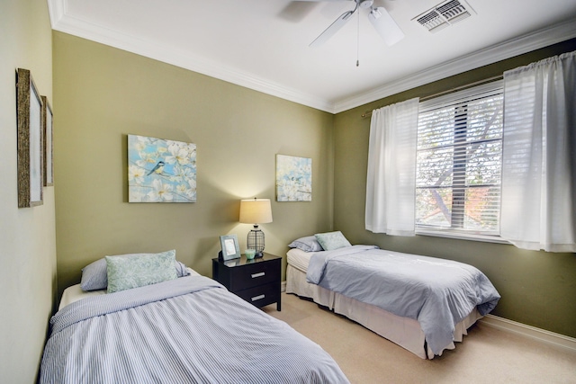bedroom featuring visible vents, carpet flooring, and ornamental molding