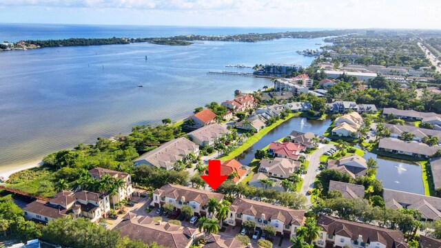 aerial view featuring a residential view and a water view