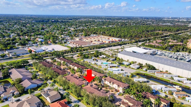 aerial view with a residential view and a water view