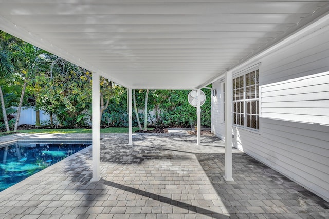 view of patio with an outdoor pool and a fenced backyard