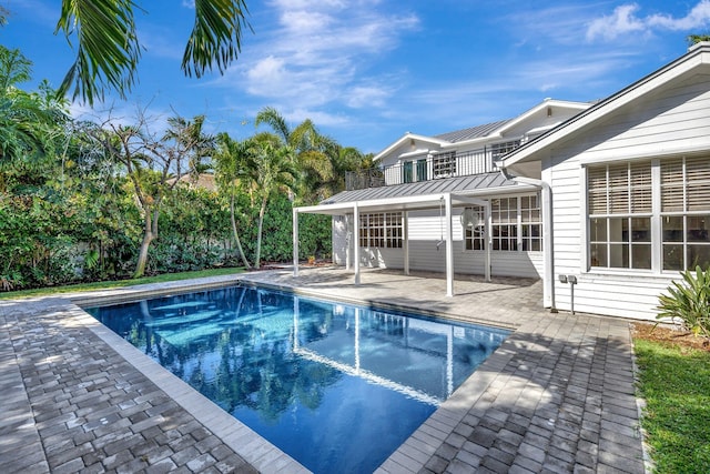 pool with a patio area