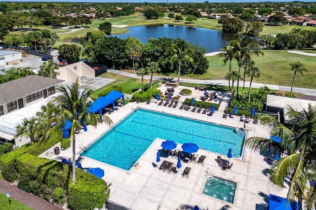 bird's eye view with a residential view and a water view
