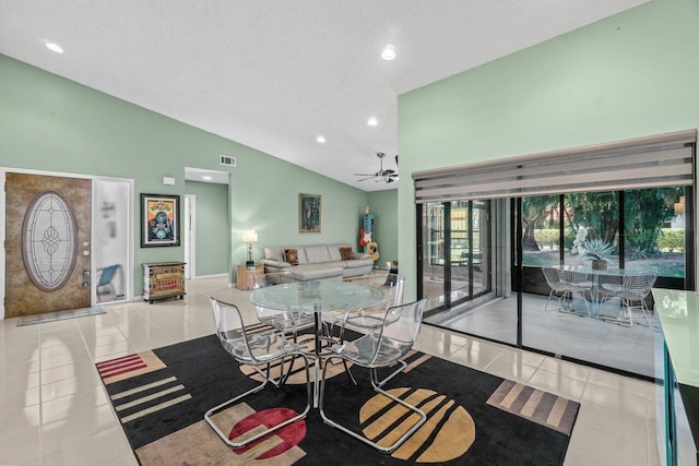 dining space featuring lofted ceiling, recessed lighting, light tile patterned floors, visible vents, and ceiling fan
