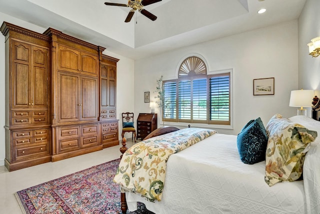 bedroom with recessed lighting, a ceiling fan, and a raised ceiling