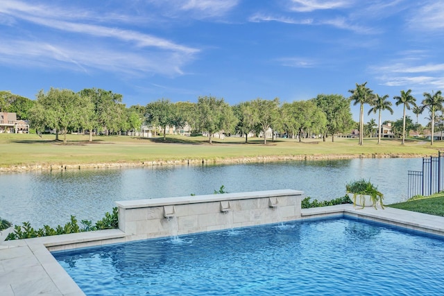 view of pool featuring a water view and a lawn