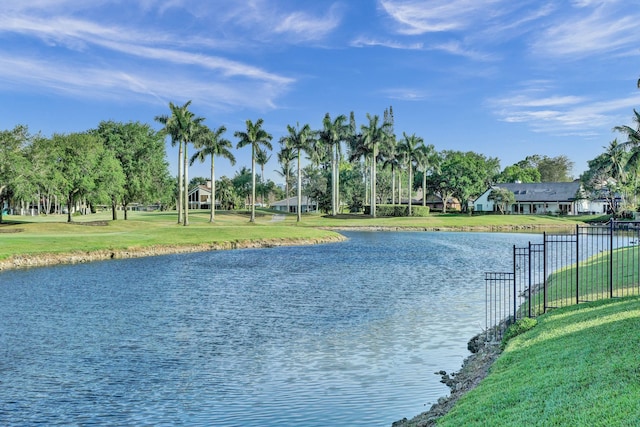 view of water feature with fence