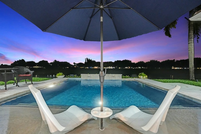 pool featuring a patio area