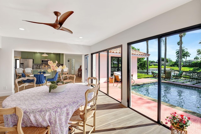 4730 S Lake Dr, Boynton Beach, FL 33436 - dining room with recessed lighting, baseboards, light wood-style floors, and ceiling fan
