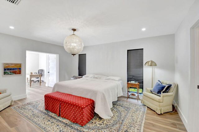 4730 S Lake Dr, Boynton Beach, FL 33436 - bedroom featuring light wood finished floors, baseboards, a notable chandelier, and recessed lighting
