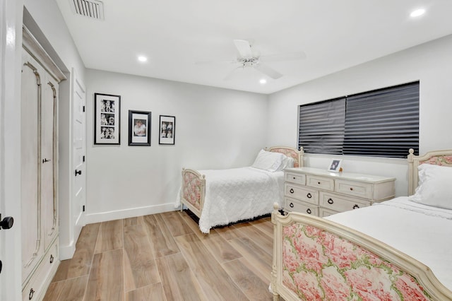 4730 S Lake Dr, Boynton Beach, FL 33436 - bedroom with baseboards, visible vents, light wood-style flooring, and recessed lighting