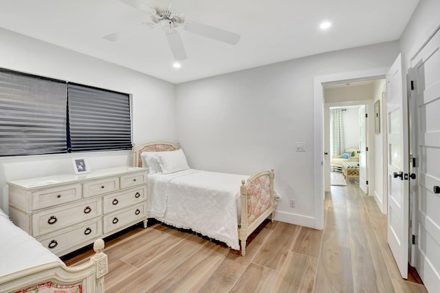4730 S Lake Dr, Boynton Beach, FL 33436 - bedroom with a ceiling fan, recessed lighting, baseboards, and light wood-type flooring