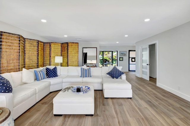 4730 S Lake Dr, Boynton Beach, FL 33436 - living room featuring baseboards, visible vents, recessed lighting, and light wood-style floors