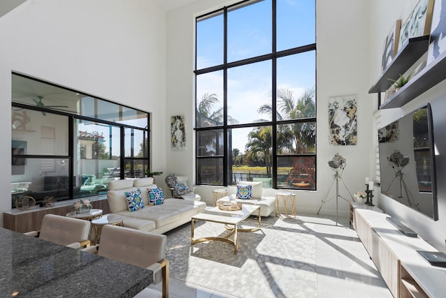 8451 Grand Prix Ln, Boynton Beach, FL 33472 - living area featuring a towering ceiling