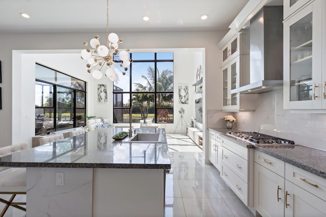 8451 Grand Prix Ln, Boynton Beach, FL 33472 - kitchen with wall chimney range hood, a sink, stainless steel appliances, and plenty of natural light