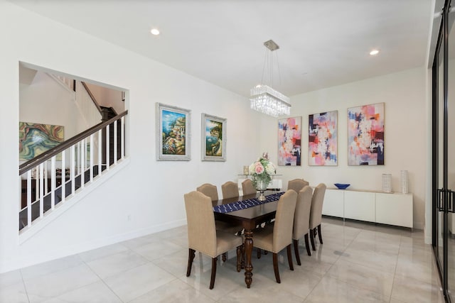 8451 Grand Prix Ln, Boynton Beach, FL 33472 - dining space featuring stairs, a notable chandelier, light tile patterned floors, baseboards, and recessed lighting