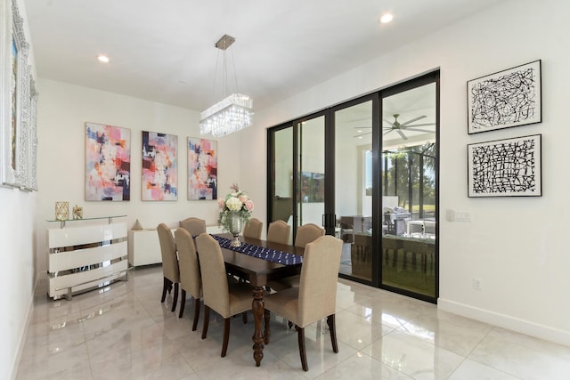 8451 Grand Prix Ln, Boynton Beach, FL 33472 - dining area featuring baseboards, recessed lighting, and an inviting chandelier