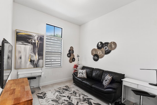 8451 Grand Prix Ln, Boynton Beach, FL 33472 - living area with tile patterned flooring and baseboards