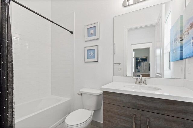 8451 Grand Prix Ln, Boynton Beach, FL 33472 - full bath with washtub / shower combination, baseboards, toilet, and vanity